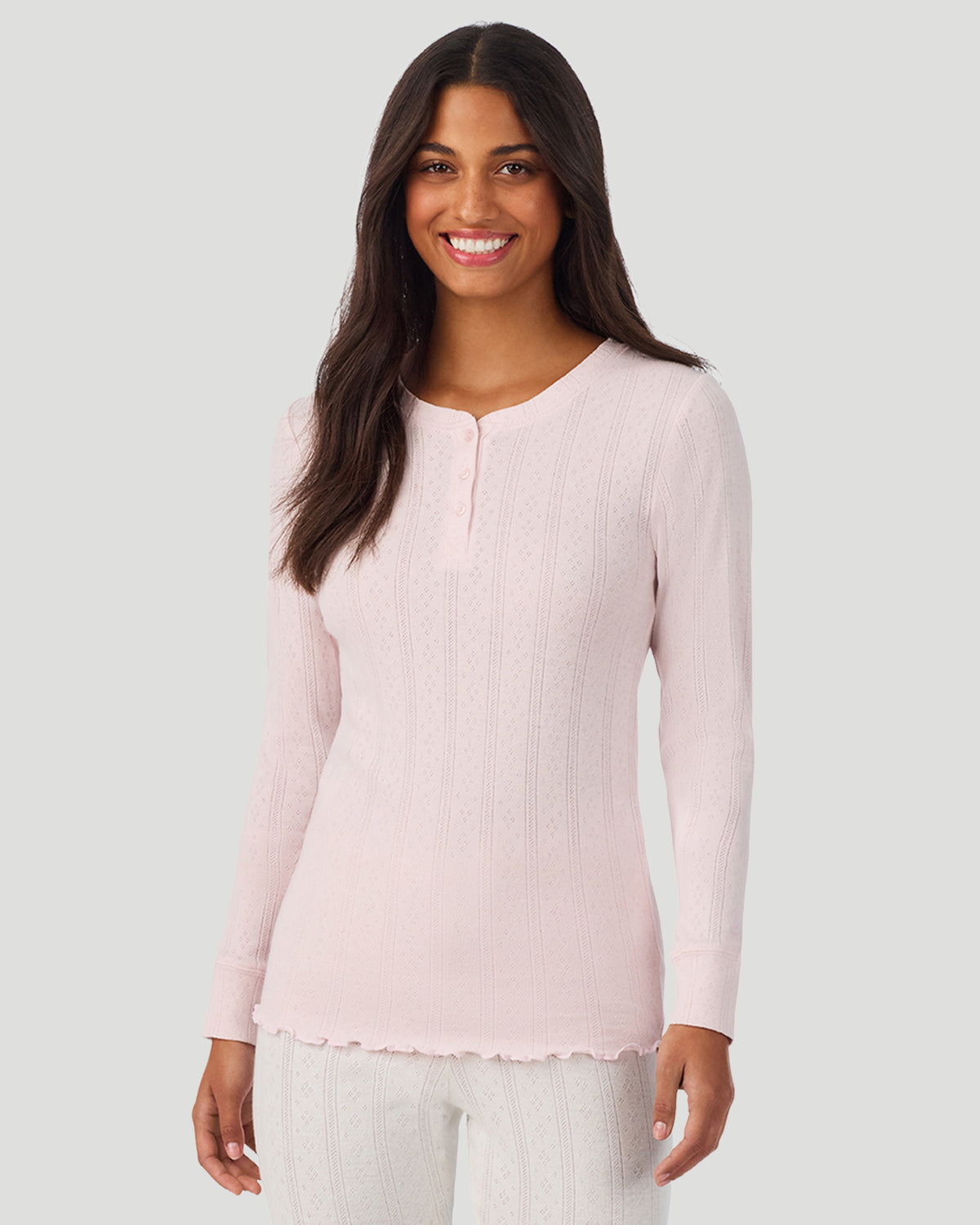 Pretty Rose; Model is wearing a size S. She is 5’7”, Bust 32”, Waist 25”, Hips 34”. @A lady is wearing Pretty Rose Cotton Pointelle Long Sleeve Henley in a front view look
