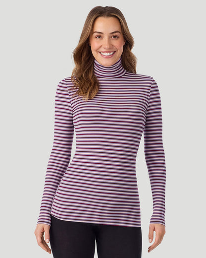 A lady wearing Lilac Stripe Softwear With Stretch Long Sleeve Turtleneck top in a front pose