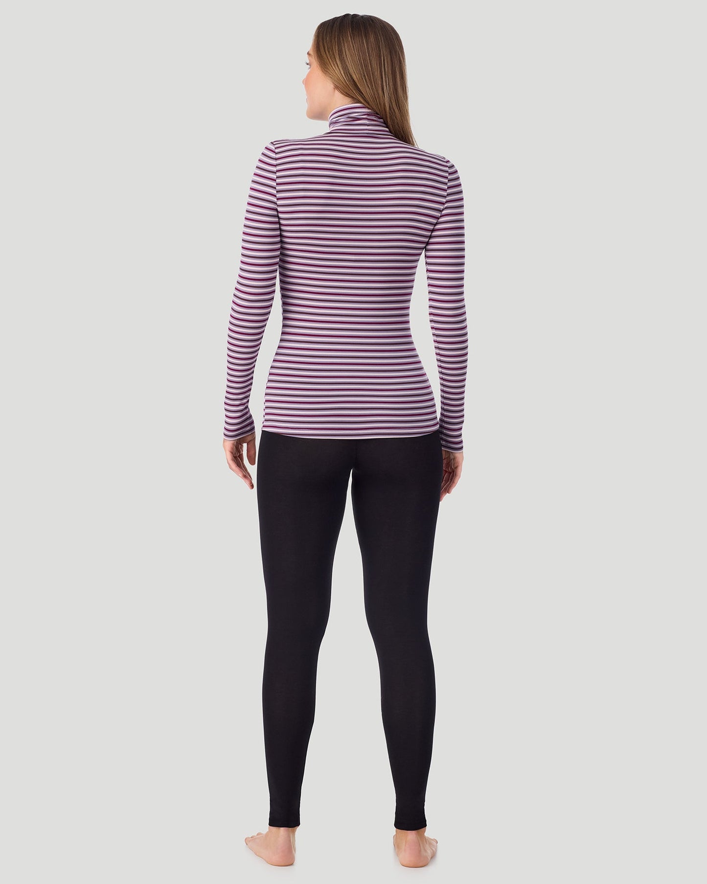 Lilac Stripe; Model is wearing a size S. She is 5’11.5”, Bust 34”, Waist 27”, Hips 38.5”. @A lady wearing Lilac Stripe Softwear With Stretch Long Sleeve Turtleneck top in a back pose