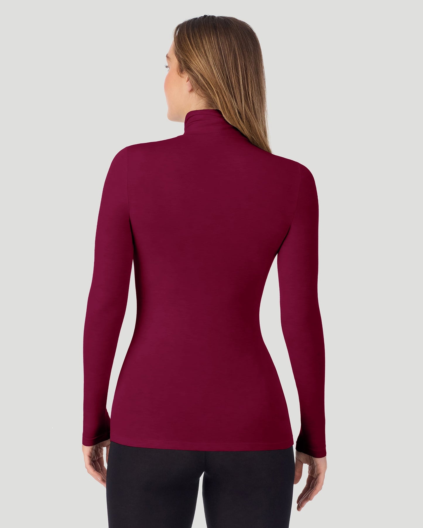 Scarlet; Model is wearing a size S. She is 5’11.5”, Bust 34”, Waist 27”, Hips 38.5”. @A lady wearing Scarlet Softwear With Stretch Long Sleeve Turtleneck top in a back pose