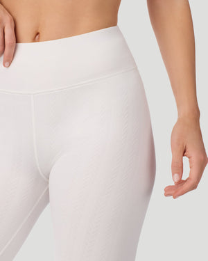  A lady wearing Cozy Cable Legging in ivory posing front view detailed close up shot