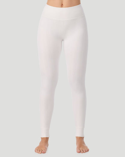  A lady wearing Cozy Cable Legging in ivory posing front view standing shot