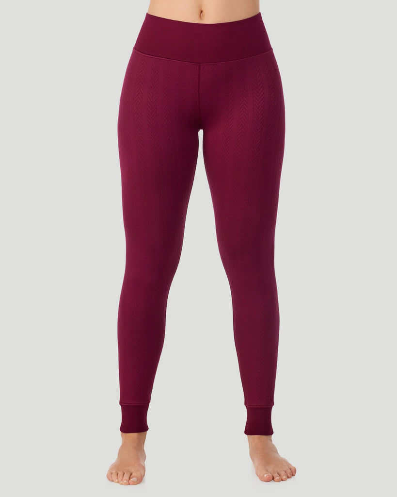  A lady wearing Cozy Cable Legging in bordeaux posing front view standing shot