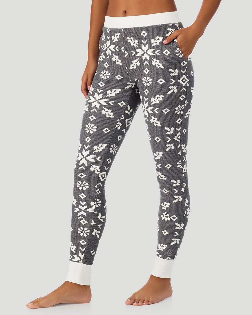 A lady wearing Stone Grey Winter Folk Cozy Stretch Thermal Legging in a side view pose