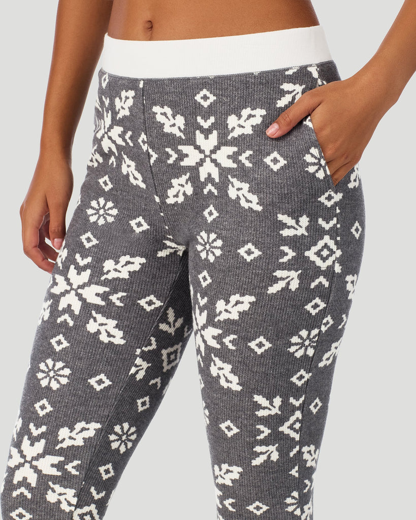  A lady wearing Stone Grey Winter Folk Cozy Stretch Thermal Legging in a front detail close up view