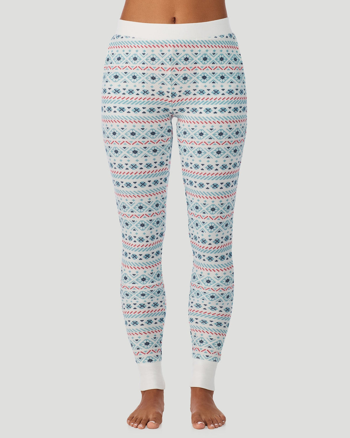 A lady wearing Cozy Stretch Thermal Legging in Ivory /Blue Fairisle
