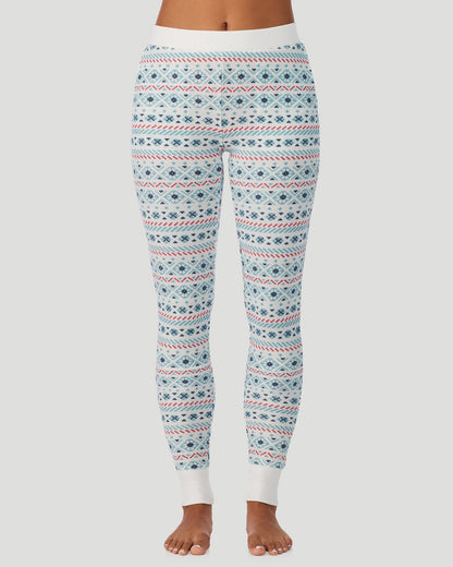 A lady wearing Cozy Stretch Thermal Legging in Ivory /Blue Fairisle