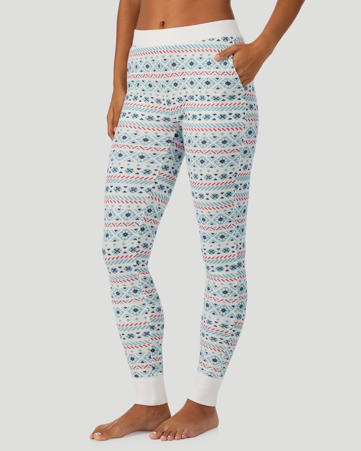 A lady wearing Cozy Stretch Thermal Legging in Ivory /Blue Fairisle