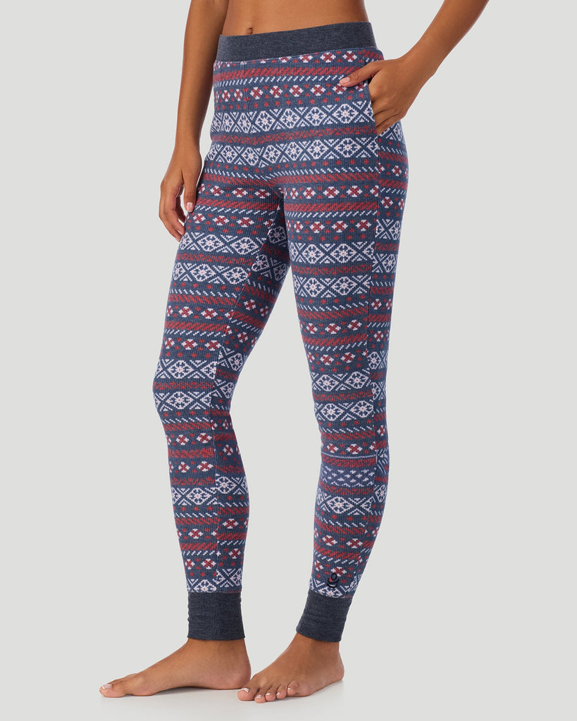  A lady wearing Medieval Blue Fairisle Cozy Stretch Thermal Legging in a side view pose