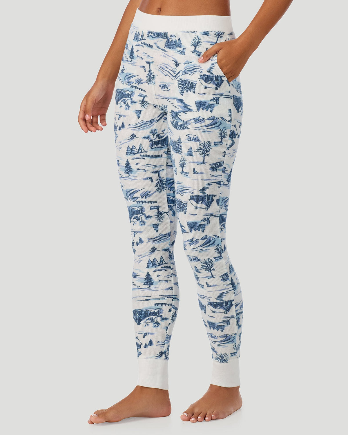 A lady wearing Cozy Stretch Thermal Legging in Blue Winter Toile