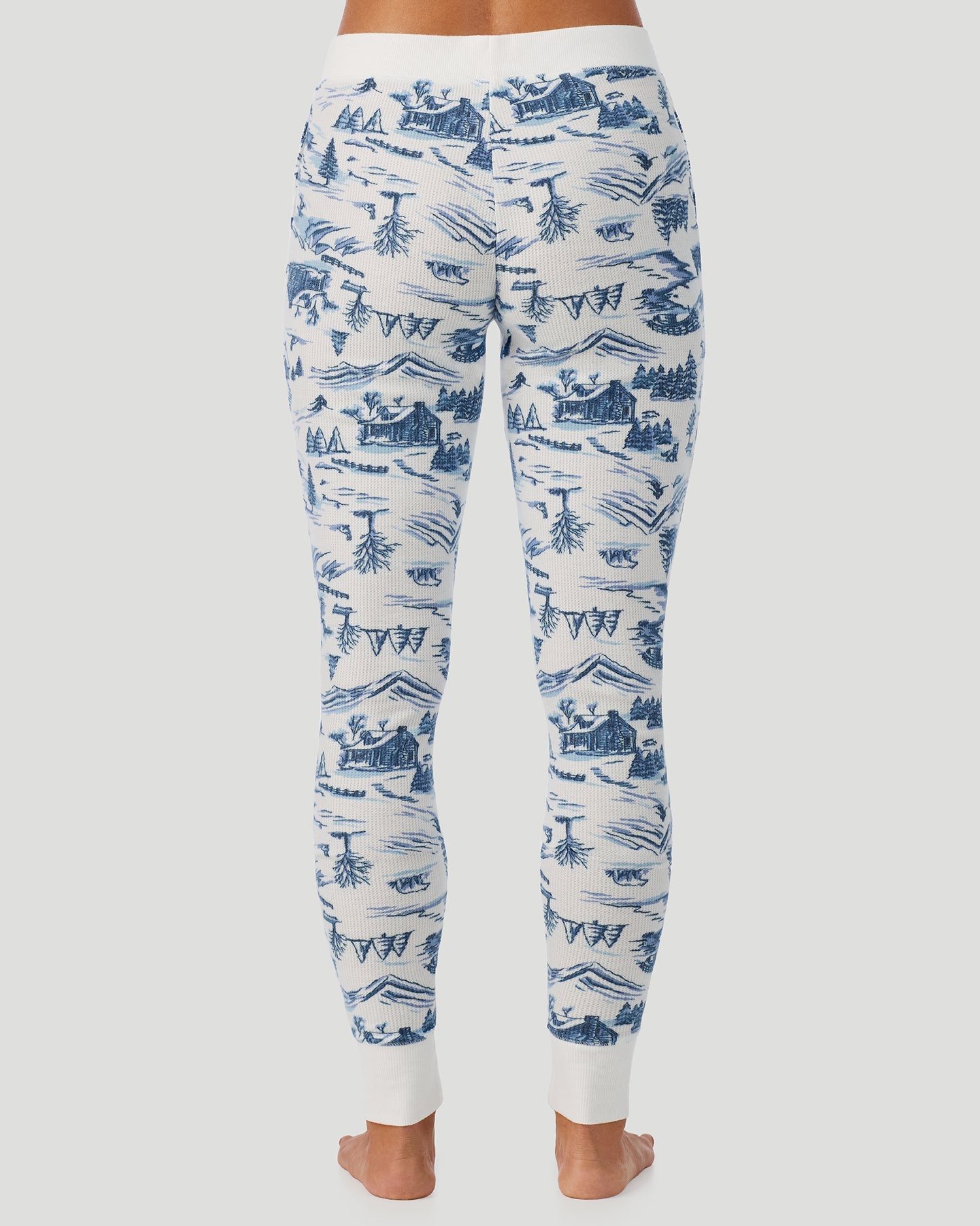A lady wearing Cozy Stretch Thermal Legging in Blue Winter Toile