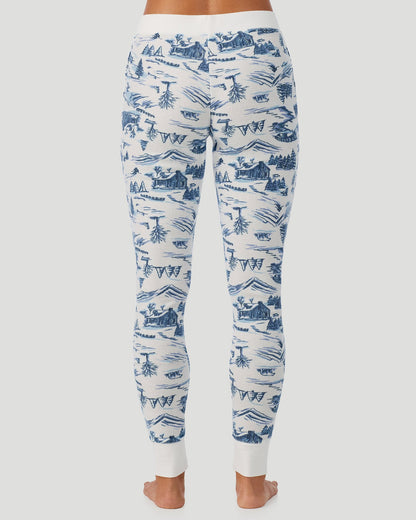 A lady wearing Cozy Stretch Thermal Legging in Blue Winter Toile
