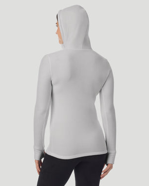  A lady wearing Light Grey Heather half zip hoodie back view arms relaxed