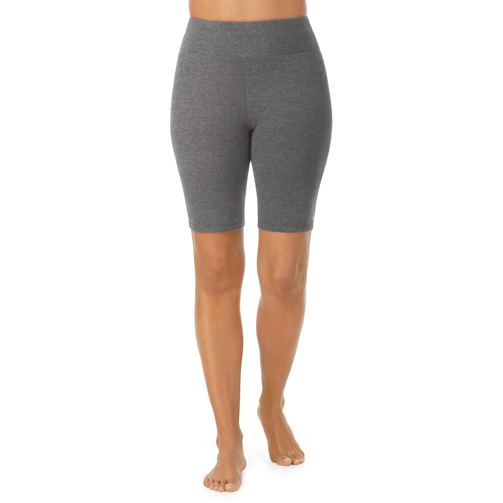 A lady wearing Dark Charcoal Heather cottonwear short.