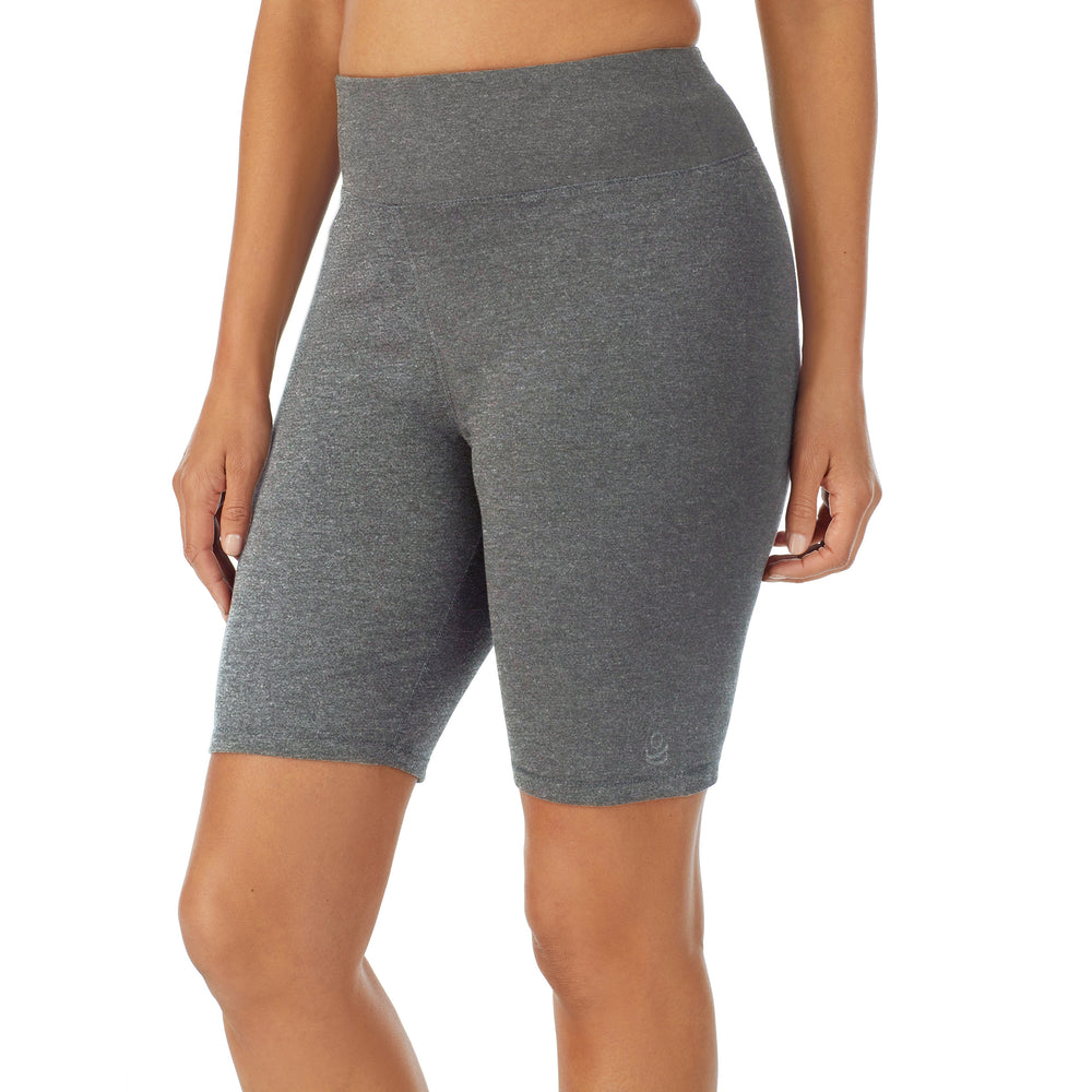 A lady wearing Dark Charcoal Heather cottonwear short.