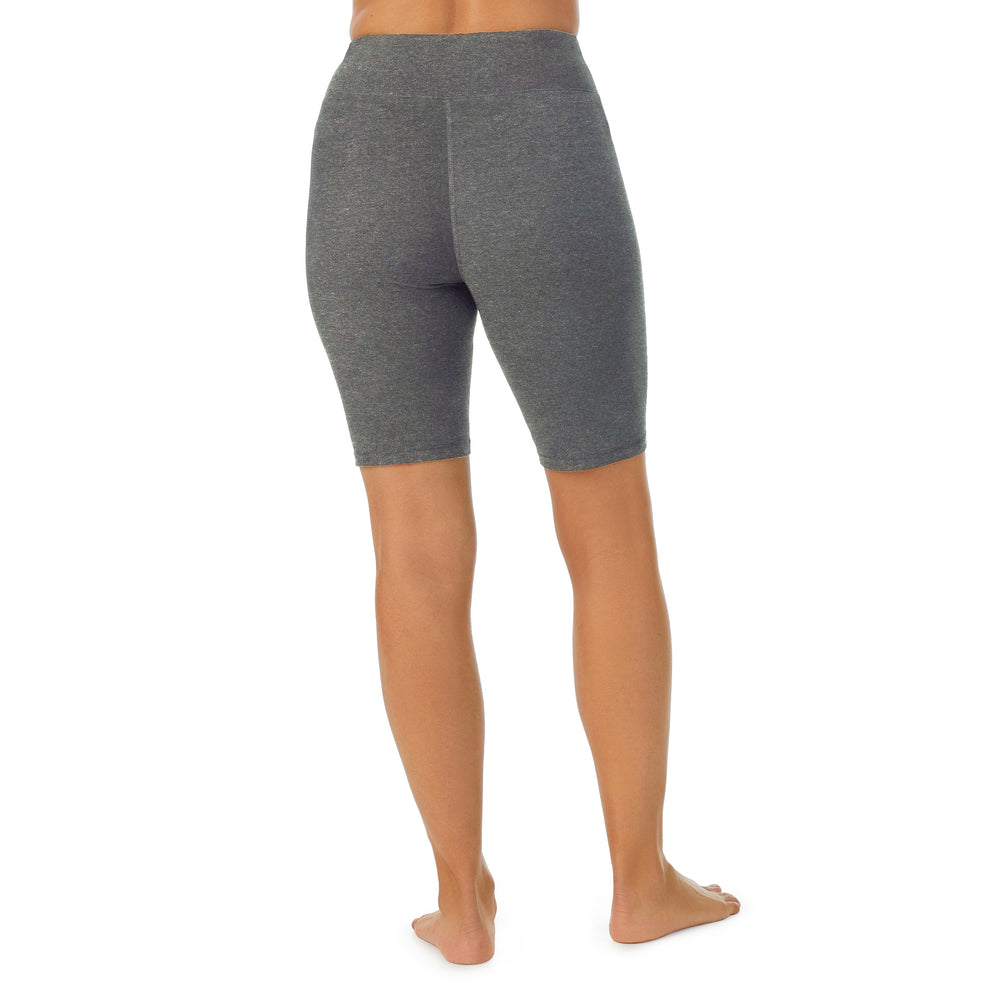A lady wearing Dark Charcoal Heather cottonwear short.