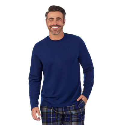 Blue/ Grey Plaid;Model is wearing size M. He is 6'2", Waist 32", Inseam 34".@A man wearing blue Mens Cozy Lodge Long Sleeve Crew and blue grey plaid Pajama Pant 2-pc Set