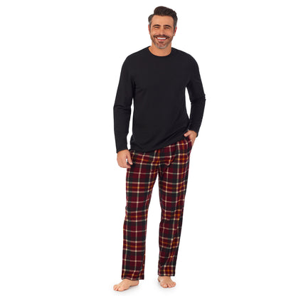 Red Plaid;Model is wearing size M. He is 6'2", Waist 32", Inseam 34".@A man wearing black Mens Cozy Lodge Long Sleeve Crew and red plaid Pajama Pant 2-pc Set