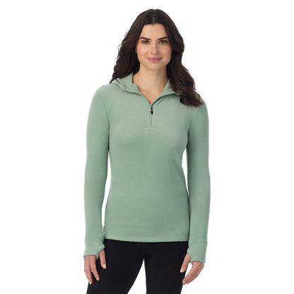 Soft Olive; Model is wearing a size S. She is 5’9”, Bust 34”, Waist 25”, Hips 36”@ A Lady is wearing Soft Olive Fleecewear With Stretch Long Sleeve Half Zip Hoodie !94% Recycled Polyester, 6% Spandex!