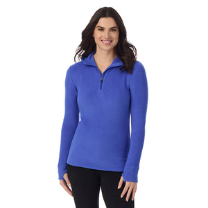  A Lady is wearing Dazzling Blue Fleecewear With Stretch Long Sleeve Half Zip Hoodie !94% Recycled Polyester, 6% Spandex!