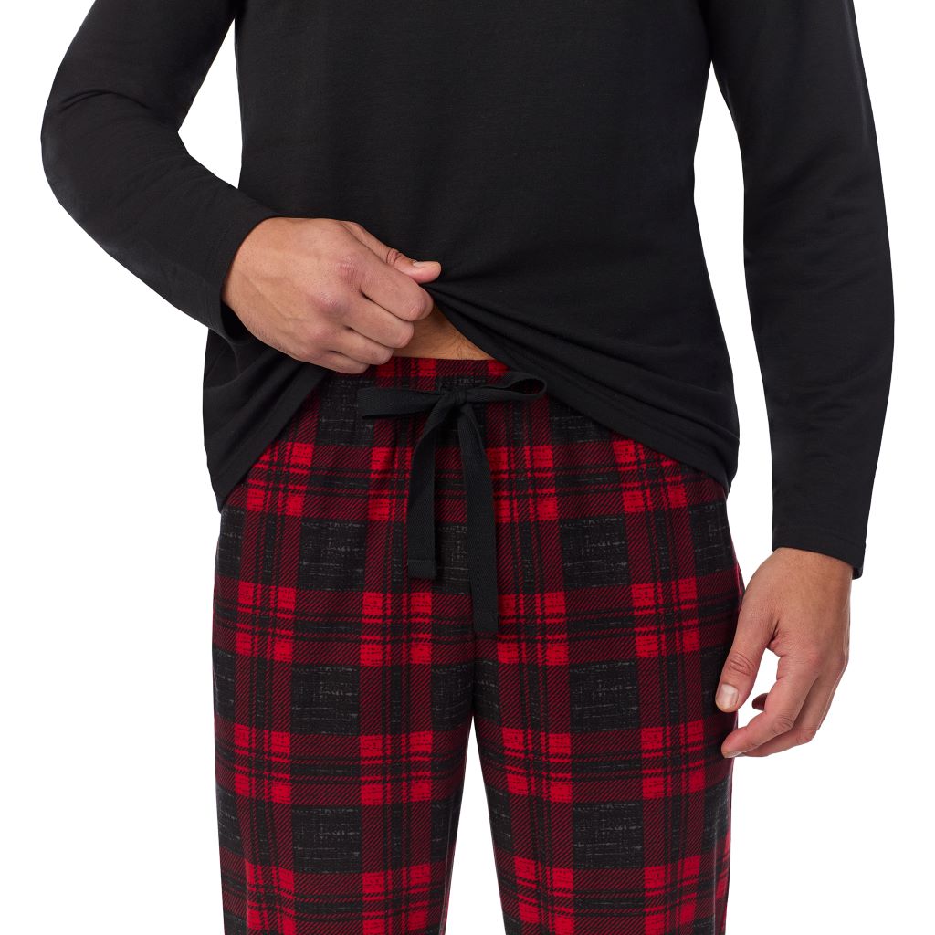 Red Buffalo Check; Model is wearing a size M. He is 6’2”, Waist is 32”, Inseam 34”@ A Man is wearing Red Buffalo Check Mens Cozy Lodge Long Sleeve Crew and Pajama Pant 2-Pc Set