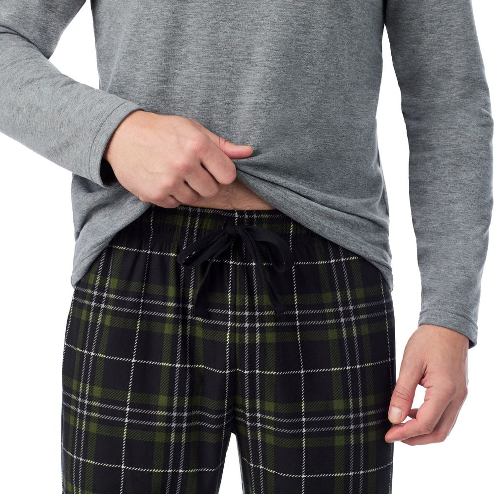 A man wearing 
Cozy Lodge Long Sleeve Crew and Pajama Pant 2-Pc Set