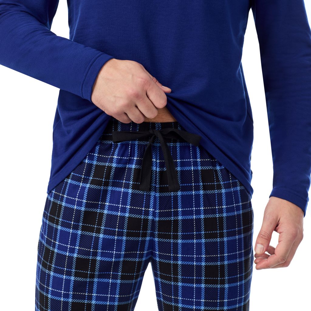 Royal Blue/ Royal Tartan; Model is wearing a size M. He is 6’2”, Waist is 32”, Inseam 34”@A man wearing 
Cozy Lodge Long Sleeve Crew and Pajama Pant 2-Pc Set
