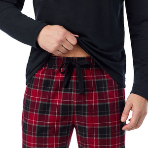 A man wearing 
Cozy Lodge Long Sleeve Crew and Pajama Pant 2-Pc Set