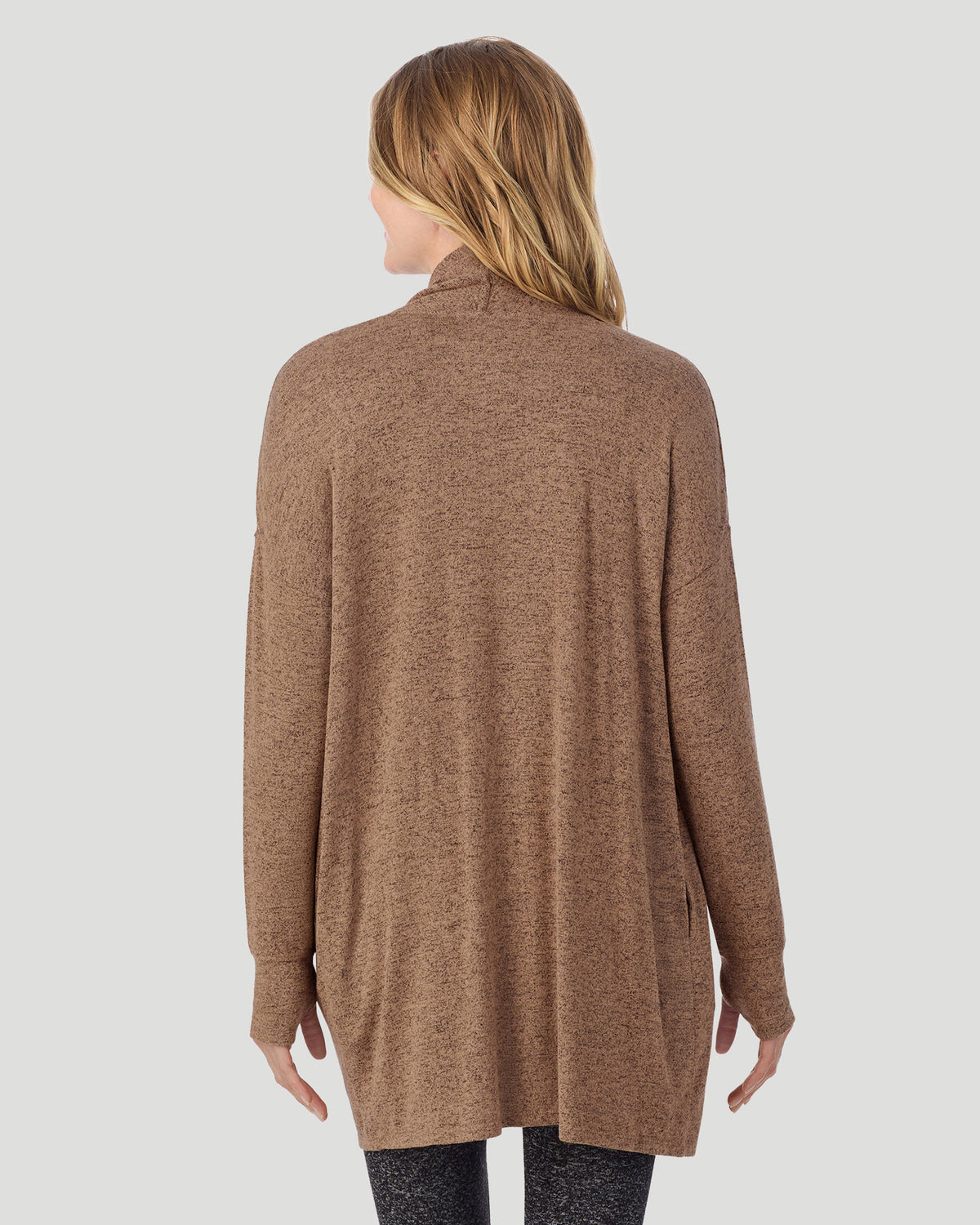  A lady wearing Marled Walnut Taupe SoftKnit Wrap in a back view closer look