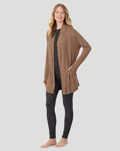  A lady wearing Marled Walnut Taupe SoftKnit Wrap in a front view standing look