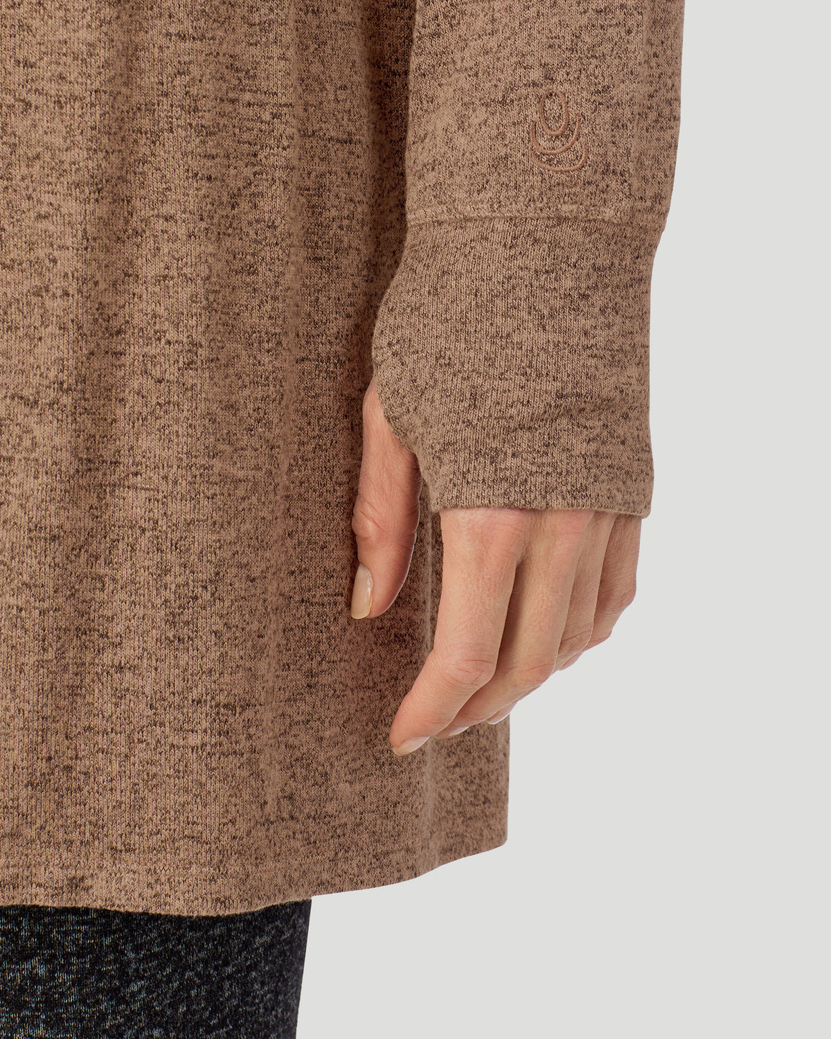  A lady wearing Marled Walnut Taupe SoftKnit Wrap in a front view detail close up look