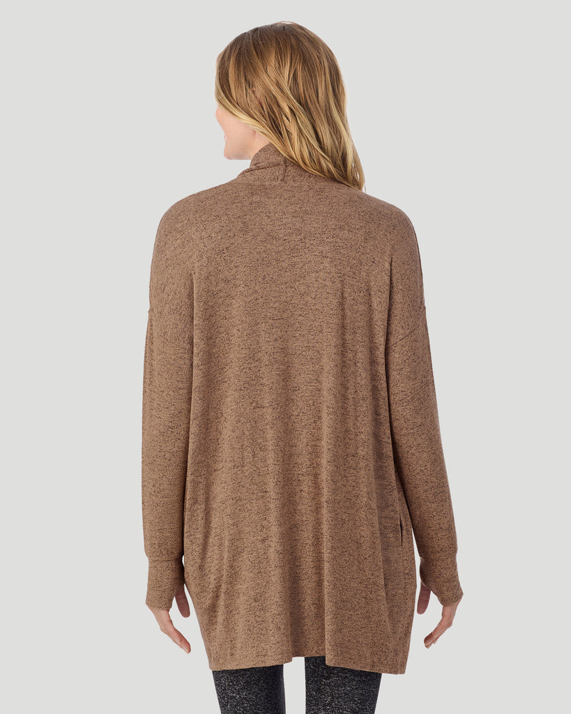  A lady wearing Marled Walnut Taupe SoftKnit Wrap in a back view closer look