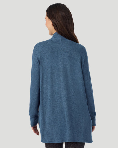  A lady wearing Deep Chambray SoftKnit Wrap in a back view closer look