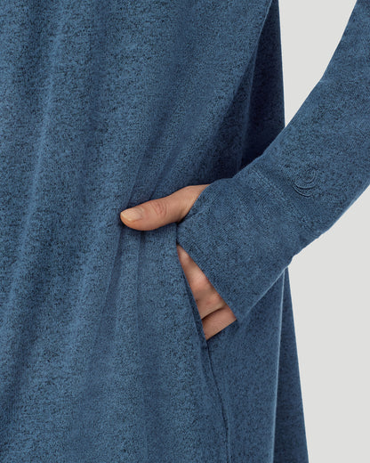  A lady wearing Deep Chambray SoftKnit Wrap in a front view detail close up look