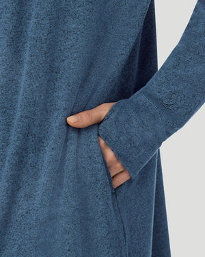  A lady wearing Deep Chambray SoftKnit Wrap in a front view detail close up look