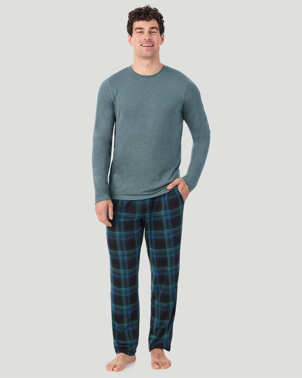 A Man is wearing Juniper Spacedye /Juniper Black Plaid Mens Classic Long Sleeve Crew and Pajama Pant 2-Pc Set in a front view standing pose