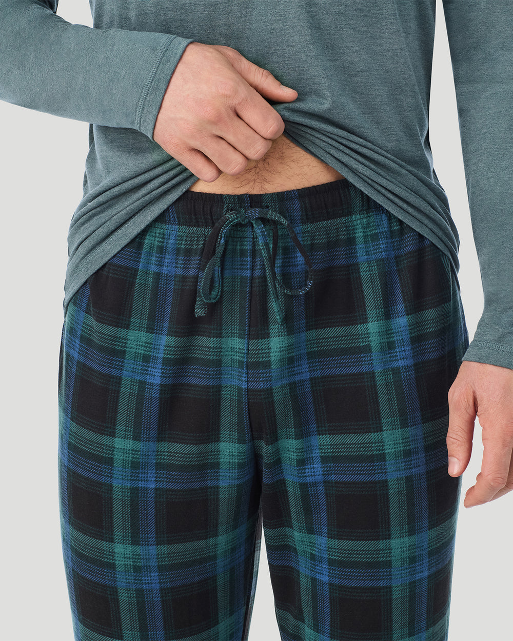 A Man is wearing Juniper Spacedye /Juniper Black Plaid Mens Classic Long Sleeve Crew and Pajama Pant 2-Pc Set in a front view detail close up look