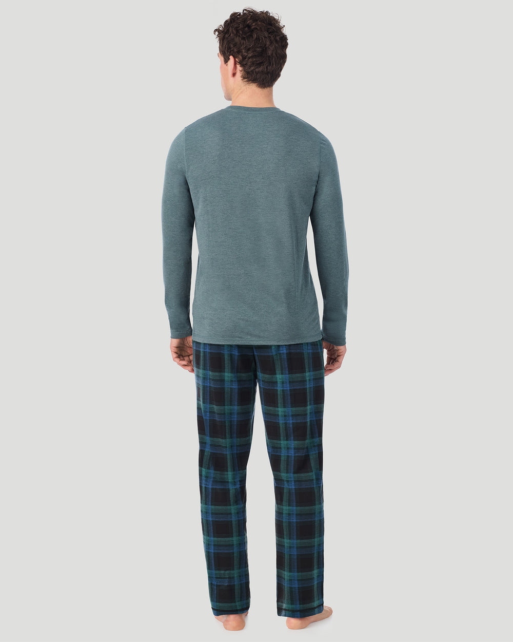 A Man is wearing Juniper Spacedye /Juniper Black Plaid Mens Classic Long Sleeve Crew and Pajama Pant 2-Pc Set in a back view standing pose