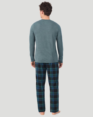 A Man is wearing Juniper Spacedye /Juniper Black Plaid Mens Classic Long Sleeve Crew and Pajama Pant 2-Pc Set in a back view standing pose