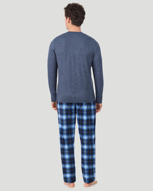 A Man is wearing Navy Spacedye/Navy Blazer Plaid Mens Classic Long Sleeve Crew and Pajama Pant 2-Pc Set in a back view standing pose