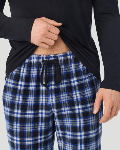 A Man is wearing Black/Blue Black Plaid Mens Cabin Fleece Long Sleeve Crew and Pajama Pant 2-Pc Set in a front view detail close up look