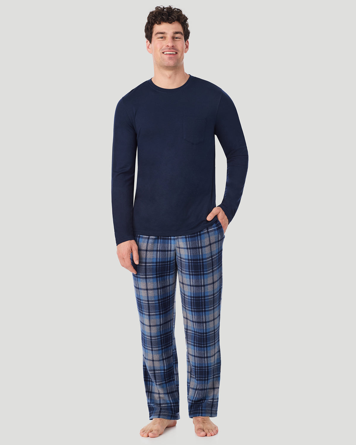 A Man is wearing Blue/Navy Grey Plaid Mens Cabin Fleece Long Sleeve Crew and Pajama Pant 2-Pc Set in a front view pose
