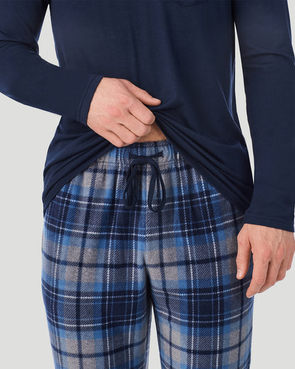 A Man is wearing Blue/Navy Grey Plaid Mens Cabin Fleece Long Sleeve Crew and Pajama Pant 2-Pc Set in a front view detail close up look