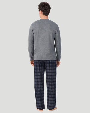 A Man is wearing Grey/Grey Multi Plaid Mens Cozy Lodge Long Sleeve Crew and Pajama Pant 2-Pc Set in a back view standing pose