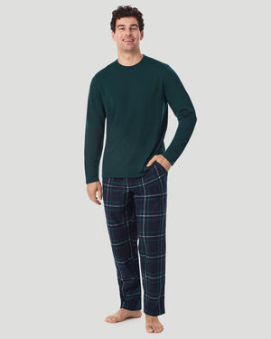 A Man is wearing Green/Green Navy Plaid Mens Cozy Lodge Long Sleeve Crew and Pajama Pant 2-Pc Set in a front view standing pose