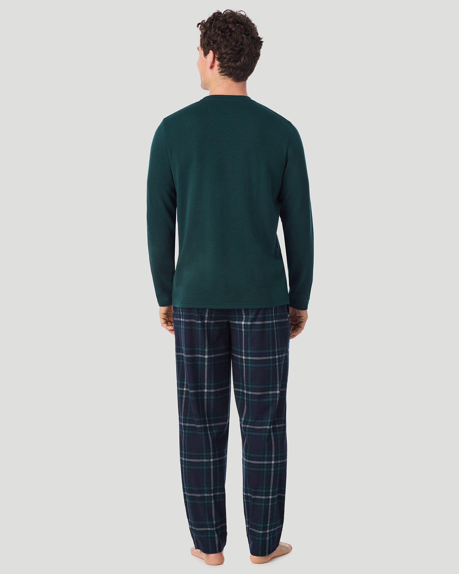 Green/Green Navy Plaid; Model is wearing a size M. He is 6’2”, Waist is 32”, Inseam 32”. @A Man is wearing Green/Green Navy Plaid Mens Cozy Lodge Long Sleeve Crew and Pajama Pant 2-Pc Set in a front view standing pose
