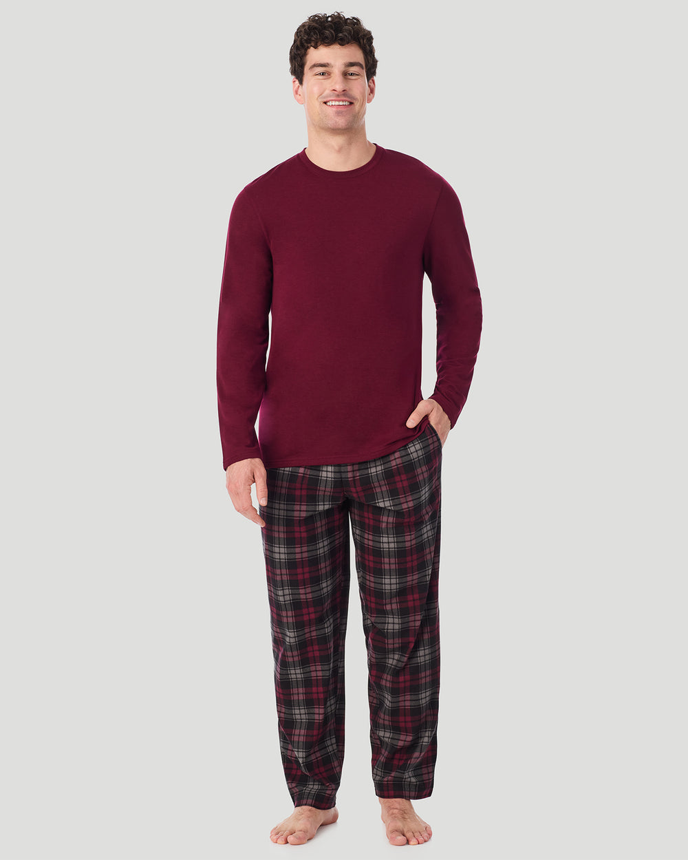 A Man is wearing Red/Red Black Plaid Mens Cozy Lodge Long Sleeve Crew and Pajama Pant 2-Pc Set in a front view standing pose