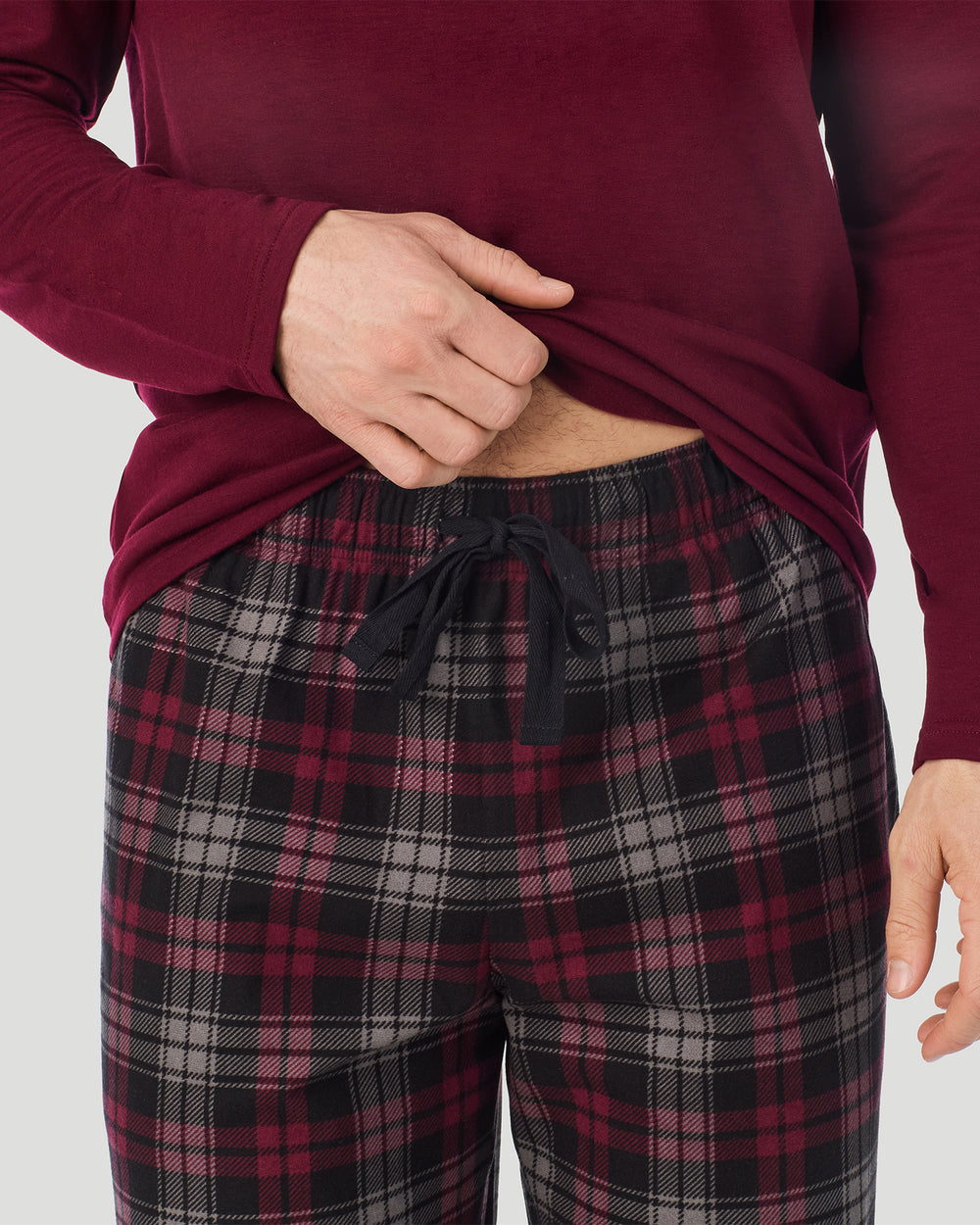 A Man is wearing Red/Red Black Plaid Mens Cozy Lodge Long Sleeve Crew and Pajama Pant 2-Pc Set in a front view detail close up look