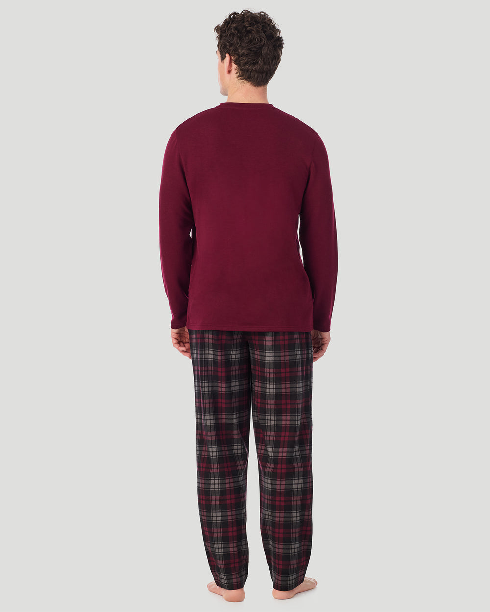 A Man is wearing Red/Red Black Plaid Mens Cozy Lodge Long Sleeve Crew and Pajama Pant 2-Pc Set in a back view standing pose