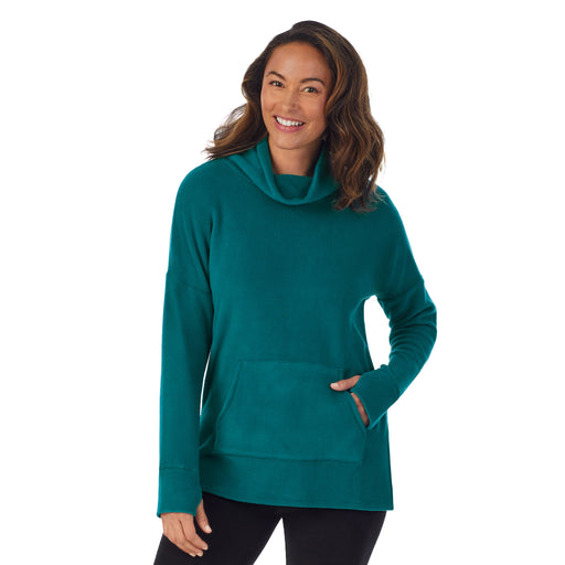 Teal Lagoon; Model is wearing size S. She is 5’8”, Bust 34”, Waist 24.5”, Hips 35”.@A lady wearing teal lagoon fleecewear with stretch lounge long sleeve tunic.